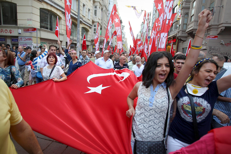Protesters at an anti-government protest at the Taksim square in Istanbul, Sunday, June 2, 2013. (AP/Thanassis Stavrakis)