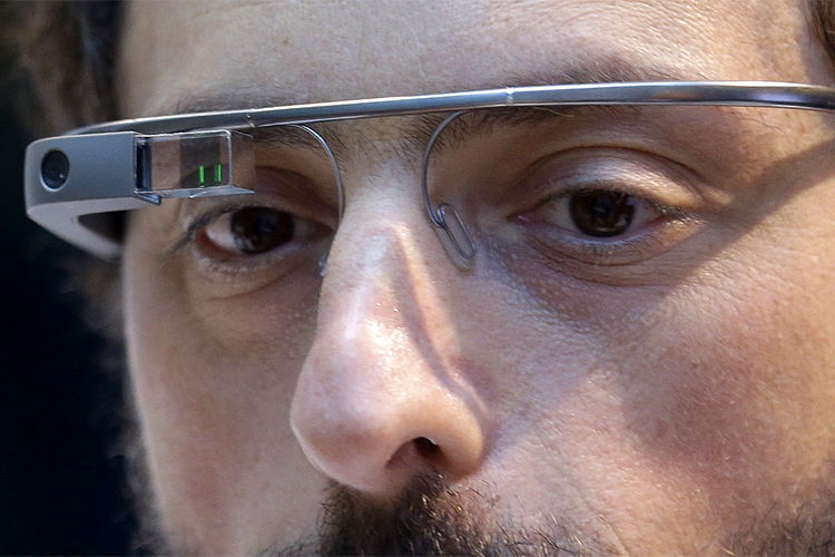 Google co-founder Sergey Brin wears a Google Glass device. (AP/Jeff Chiu)