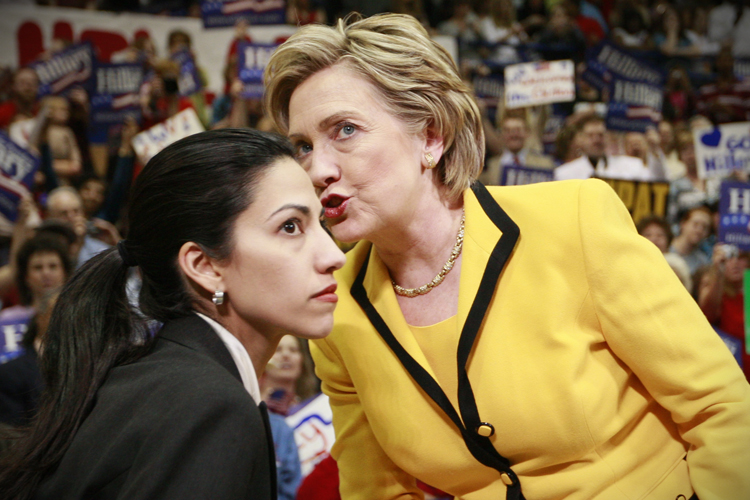 Hillary Clinton with aide Huma Abedin at a campaign rally, March 19, 2008. (AP/Charles Dharapak)
