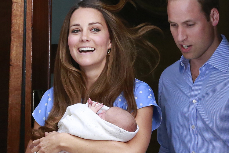 Catherine, Duchess of Cambridge, and Prince William appear with their baby son outside St Mary's Hospital, London, July 23, 2013. (Reuters/Cathal Mcnaughton)