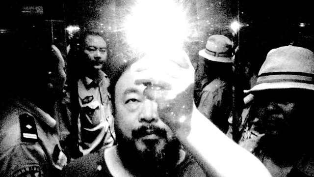 The cover of Ai Weiwei’s “Divine Comedy” album is his infamous photo first posted on Twitter from during his detention.