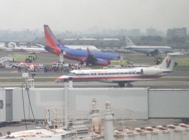 Southwest plane surrounded by first responders at Laguardia Airport (Matt Sussberg)