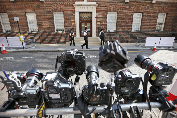 Remote-controlled cameras are set up across St. Mary's Hospital exclusive Lindo Wing in London, Monday, July 22, 2013. (AP/Lefteris Pitarakis)