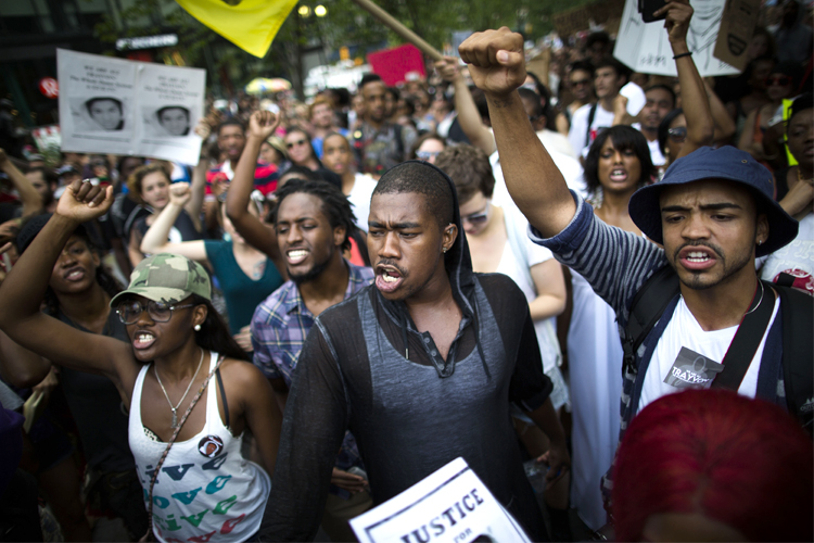 Zimmerman verdict demonstrators march toward Times Square (AP/John Minchillo)