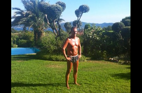 In this undated photo provided by the Austrian Freedom Party (FPOE) via Facebook, the party's head Heinz-Christian Strache poses in his bathing suit at an unknown location. As the campaign for Austrian general elections enters its grueling final phase, two high-profile contenders have gone beyond rolling up their shirt sleeves: They’ve taken off their shirts. Posing bare-chested is the newest twist on the rivalry between populist candidate Frank Stronach and Heinz-Christian Strache, who heads the anti-immigrant and EU-skeptic Freedom Party, as the two compete for the protest vote ahead of the Sept. 29 elections. (AP Photo/Austrian Freedom Party via Facebook)
