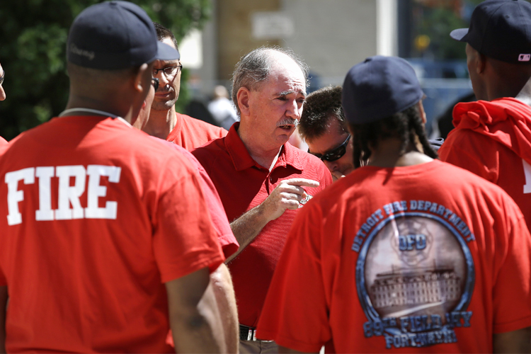 Dan McNamara, president of the Detroit Fire Fighters Association, speaks to firefighters (AP/Paul Sancya)