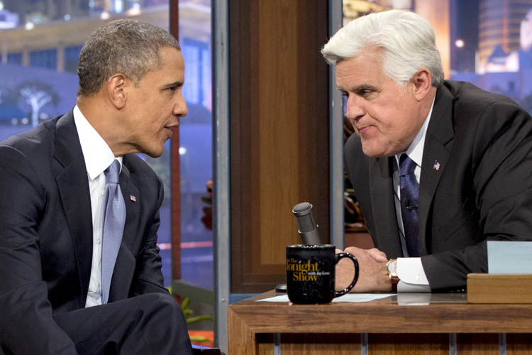 Barack Obama talks with Jay Leno during the taping of his appearance on "The Tonight Show with Jay Leno" on Aug. 6, 2013. (AP/Jacquelyn Martin)