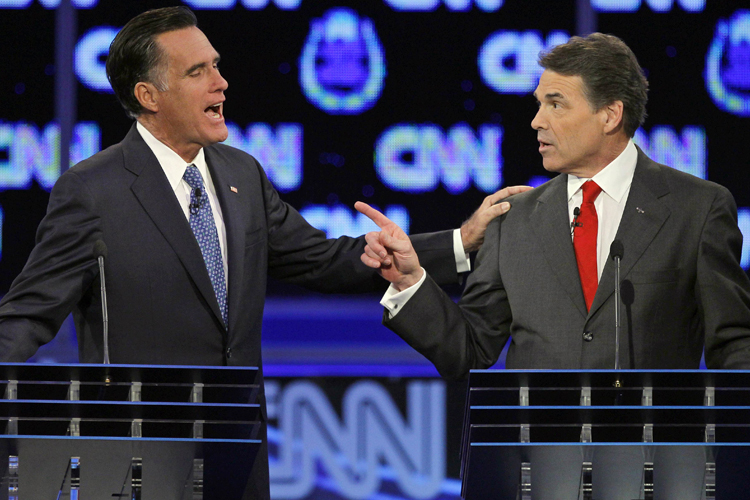 Mitt Romney and Rick Perry speak during a Republican presidential debate, July 8, 2013. (AP/Chris Carlson)