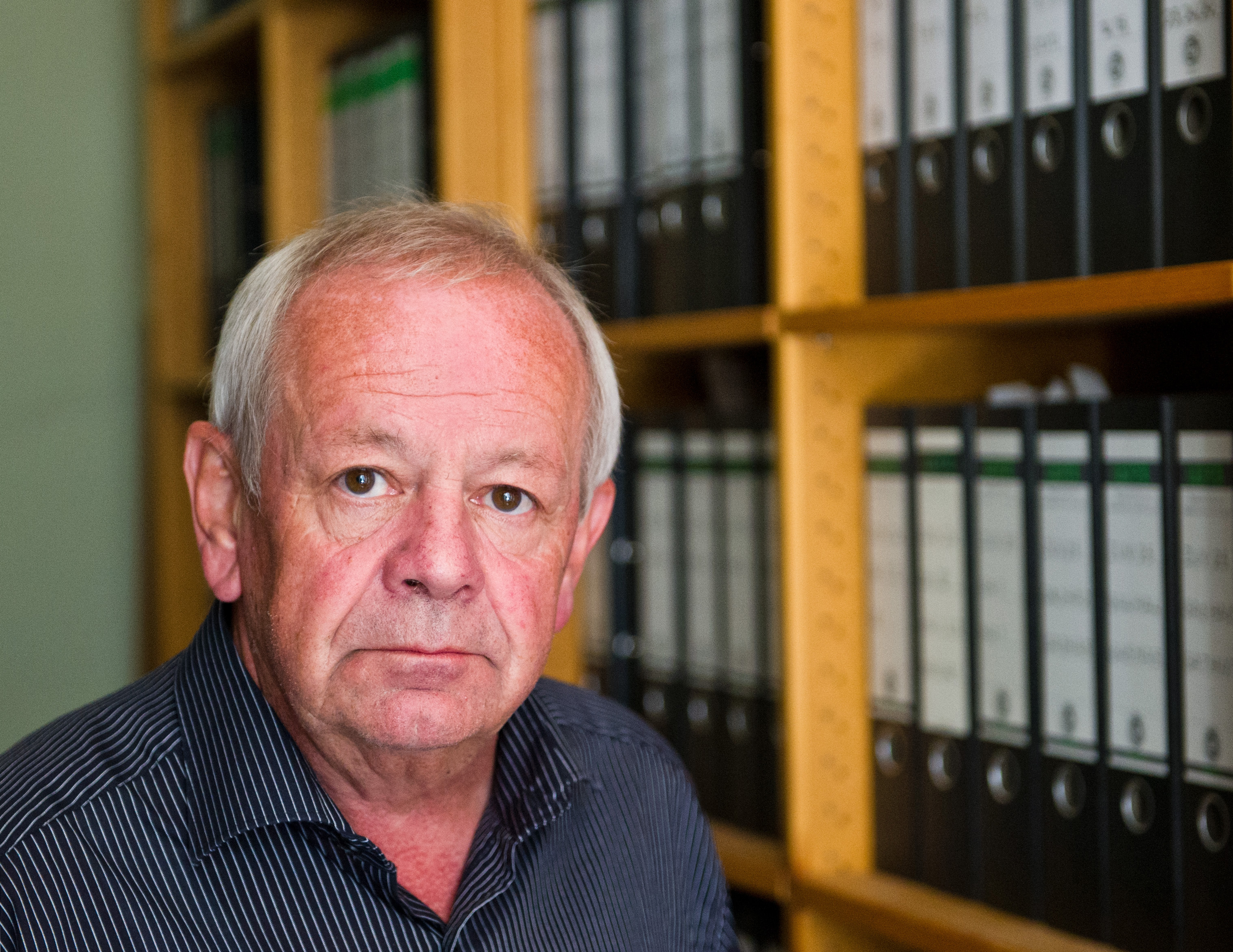 The head of Ludwigsburg federal prosecutors office, Kurt Schrimm  stands in his office in Ludwigsburg, Germany. (AP/dpa, Daniel Bockwoldt)