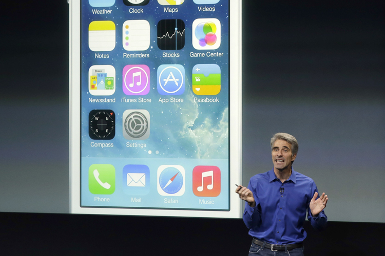Craig Federighi, senior vice president of Software Engineering at Apple, speaks about the new iOS 7 release in Cupertino, Calif., Sept. 10, 2013. (AP/Marcio Jose Sanchez)