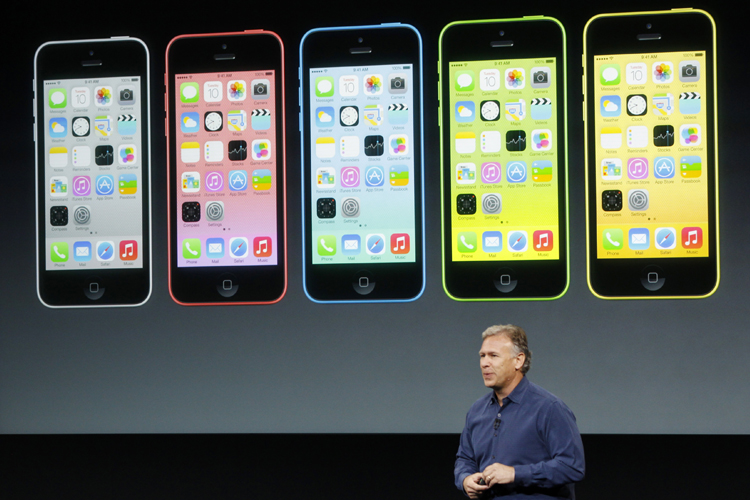 Phil Schiller, senior vice president of worldwide marketing for Apple Inc, talks about the new iPhone 5C at Apple Inc's media event in Cupertino, California September 10, 2013. (Reuters/Stephen Lam)