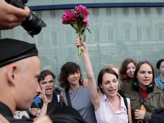 Gay rights activists protest outside the State Duma (AP)