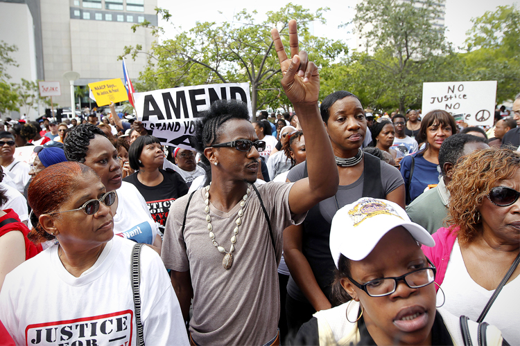 Protestors at a rally for Tracy Martin in Miami, Florida (Reuters/Andrew Innerarity)