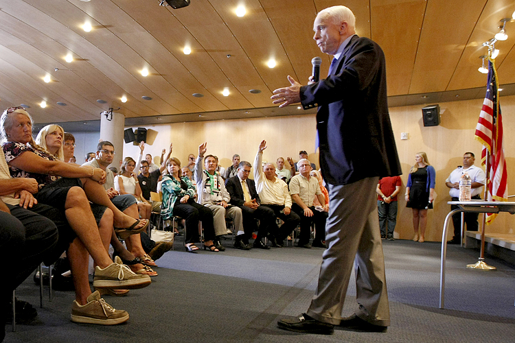 John McCain speaks with constituents during a town hall meeting in Phoenix, Sept. 5, 2013. (AP/Ralph Freso)