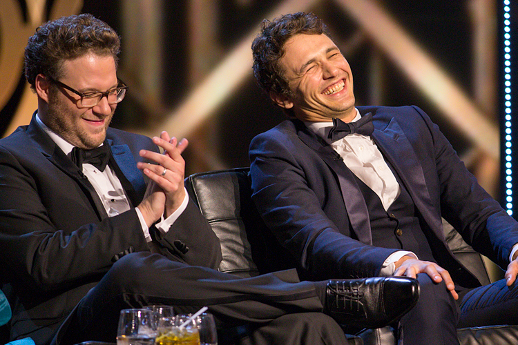 Seth Rogen and James Franco onstage during the Roast of James Franco, Aug. 25, 2013. (AP/Paul A. Hebert)