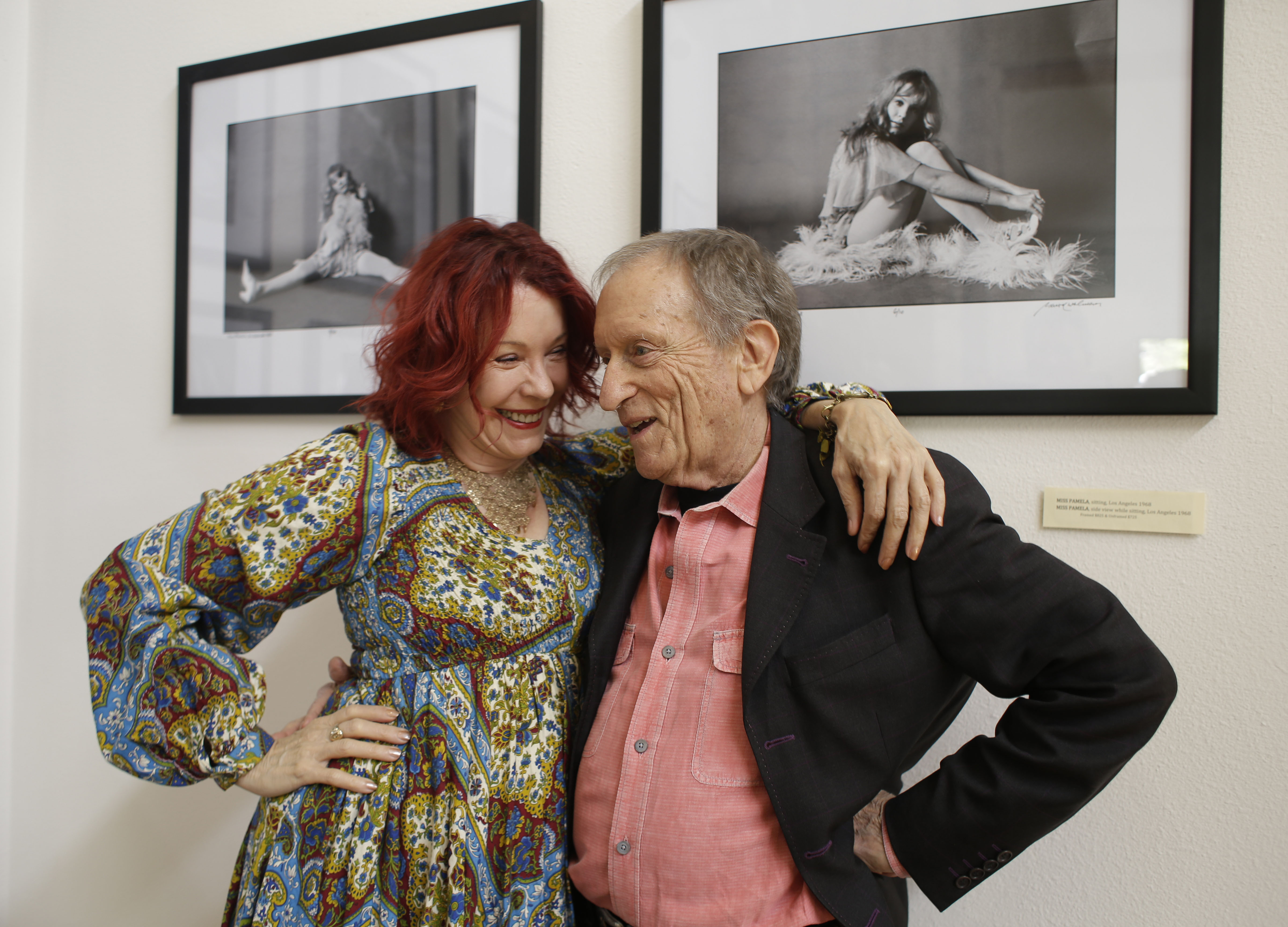 Rolling Stone photographer Baron Wolman, right, embraces Pamela Des Barres. (AP/Eric Risberg)