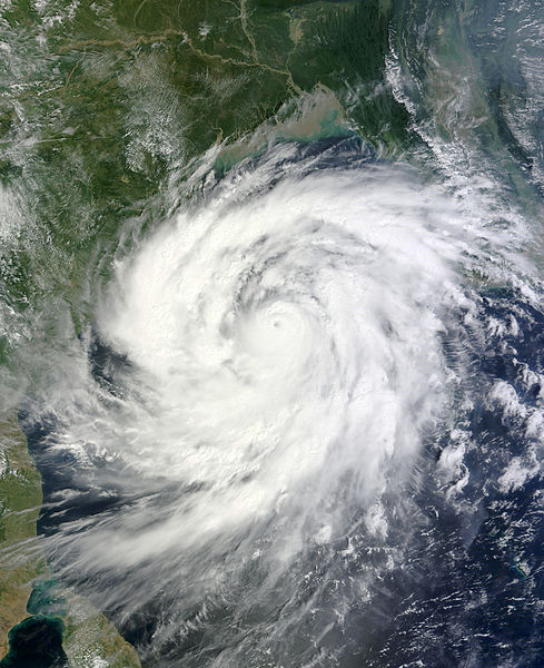 Cyclone Phailin over the Bay of Bengal on 11 October 2013. At the time the image was taken, Phailin was a violent Category 4 equivalent tropical cyclone with 1-min winds peaking at 250 km/h (155 mph) and a central pressure of 940 millibars. (Wikimedia Commons)