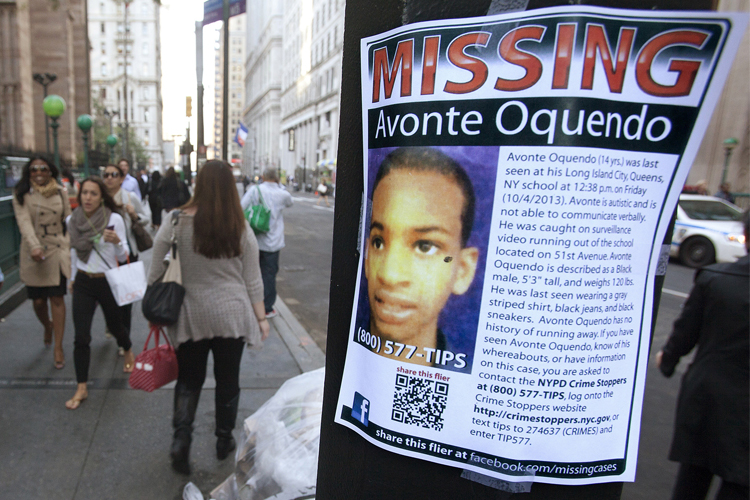 A poster for Avonte Oquendo is seen in downtown New York October 15, 2013. (Reuters/Carlo Allegri)