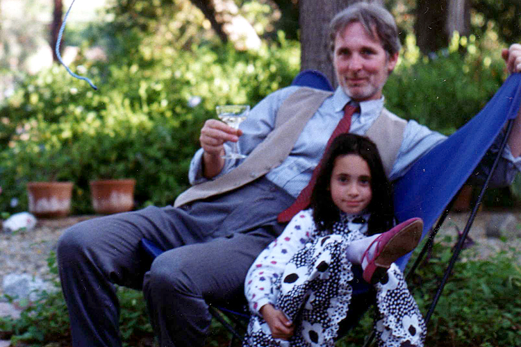 A photo of the author, as a child, with her father.