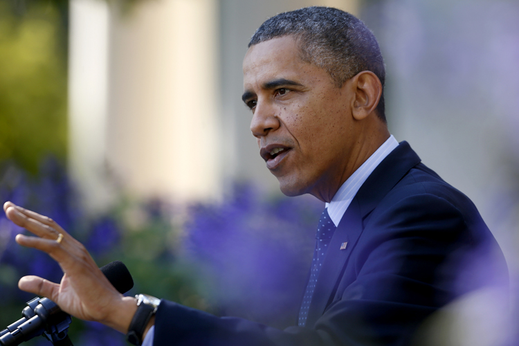 Barack Obama speaks in the Rose Garden of the White House in Washington, Monday, Oct. 21, 2013, on the initial rollout of the health care overhaul. (AP/Charles Dharapak)