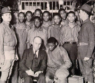 Scottsboro boys with their lawyer, Samuel Leibowitz