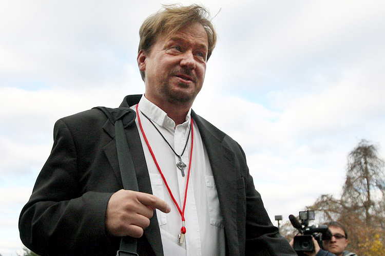 The Rev. Frank Schaefer, right, of Lebanon Pa., walks to the gymnasium with an unidentified woman, before facing his sentencing at Camp Innabah, a United Methodist retreat, in Spring City Pa. Tuesday, Nov. 19, 2013. A jury of his pastoral peers convicted Schaefer on Monday of breaking his vows by officiating his gay sons' Massachusetts wedding in 2007. Schaefer could face punishment ranging from a reprimand to a suspension to losing his minister's credentials.  (AP Photo/Chris Knight) (Chris Knight)