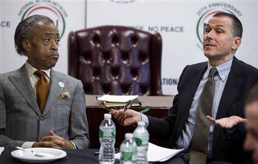 The Rev. Al Sharpton meets with Mark Lee, CEO of Barneys New York, Tuesday. (AP)
