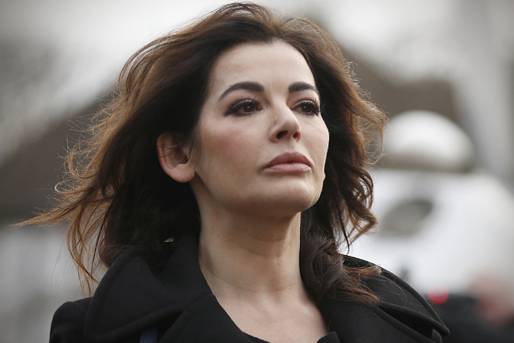 Nigella Lawson arrives at Isleworth Crown Court in London, Thursday, Dec. 5, 2013. (AP/Sang Tan)