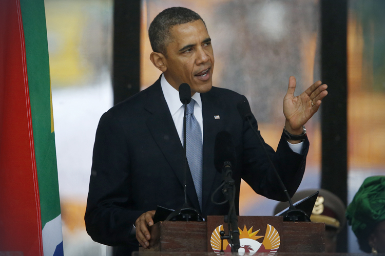 Barrack Obama speaks at the memorial service for Nelson Mandela, Johannesburg, Dec. 10, 2013. (AP/Matt Dunham)