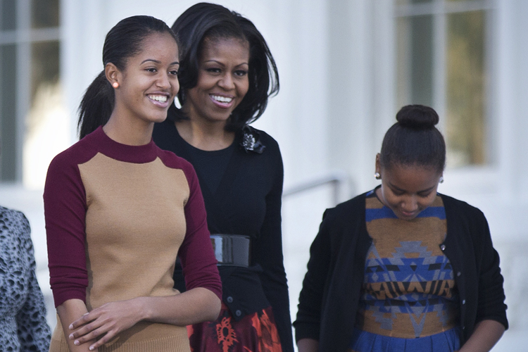 Michelle Obama, with daughters Sasha and Malia. (AP/Manuel Balce Ceneta)