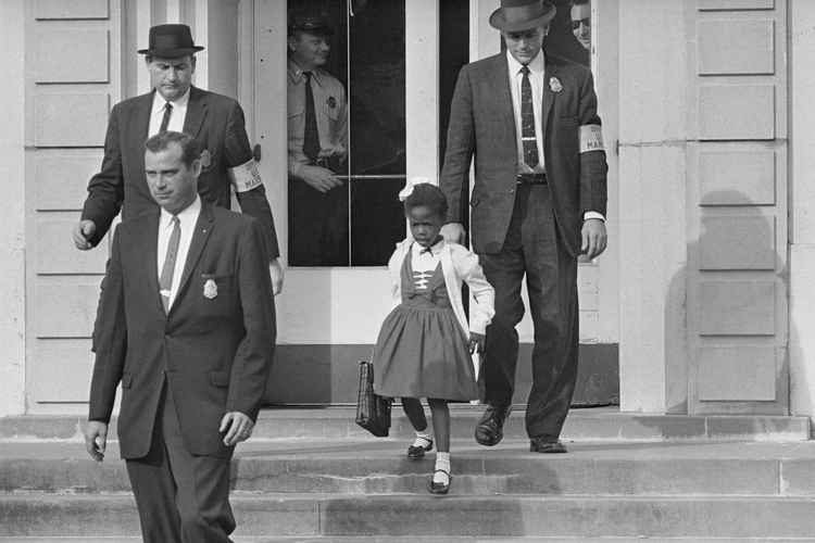 U.S. Deputy Marshals escort 6-year-old Ruby Bridges from William Frantz Elementary School in New Orleans, November 1960. (AP)