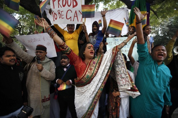 Gay rights activists protest after the country's top court ruled that a colonial-era law criminalizing homosexuality will remain in effect in India. (Credit: Altaf Qadri/AP)