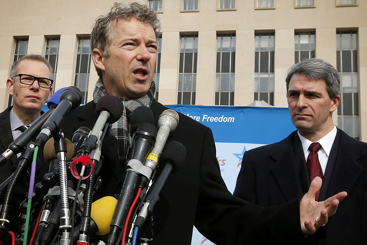 Rand Paul, center, Ken Cuccinelli, right. (AP/Charles Dharapak)