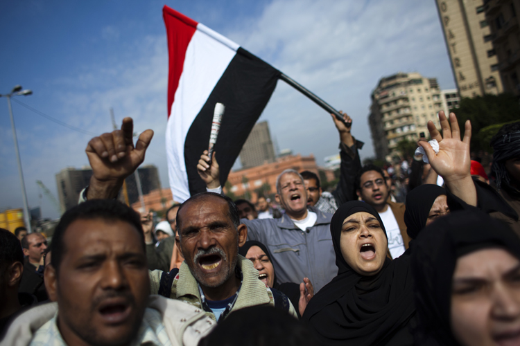 Anti-government protesters march toward Tahrir  Square in downtown Cairo, Feb. 1, 2011. (AP/Emilio Morenatti)