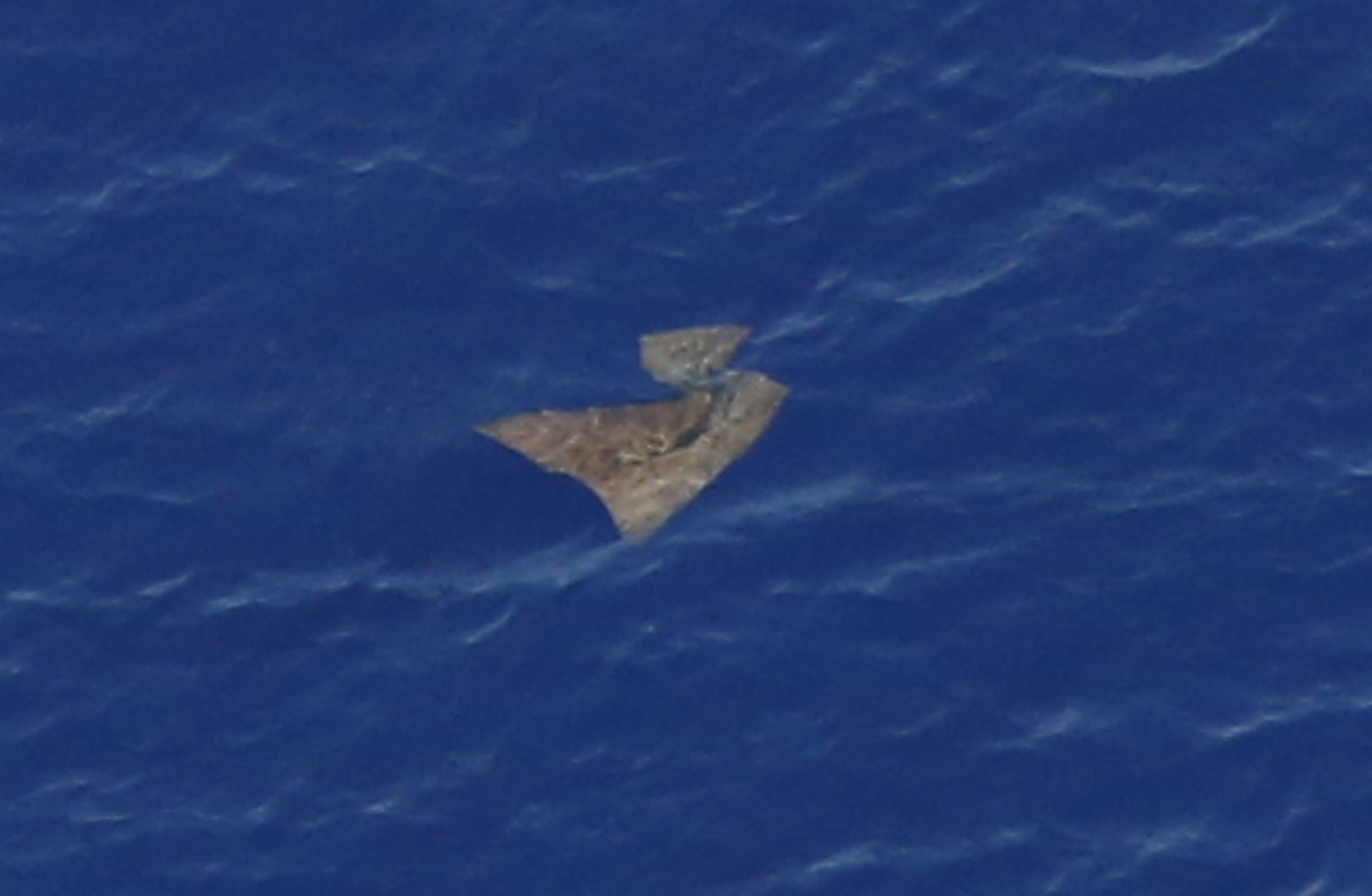 An object floats in the southern Indian Ocean in this picture taken from a Royal New Zealand Air Force (AP)
