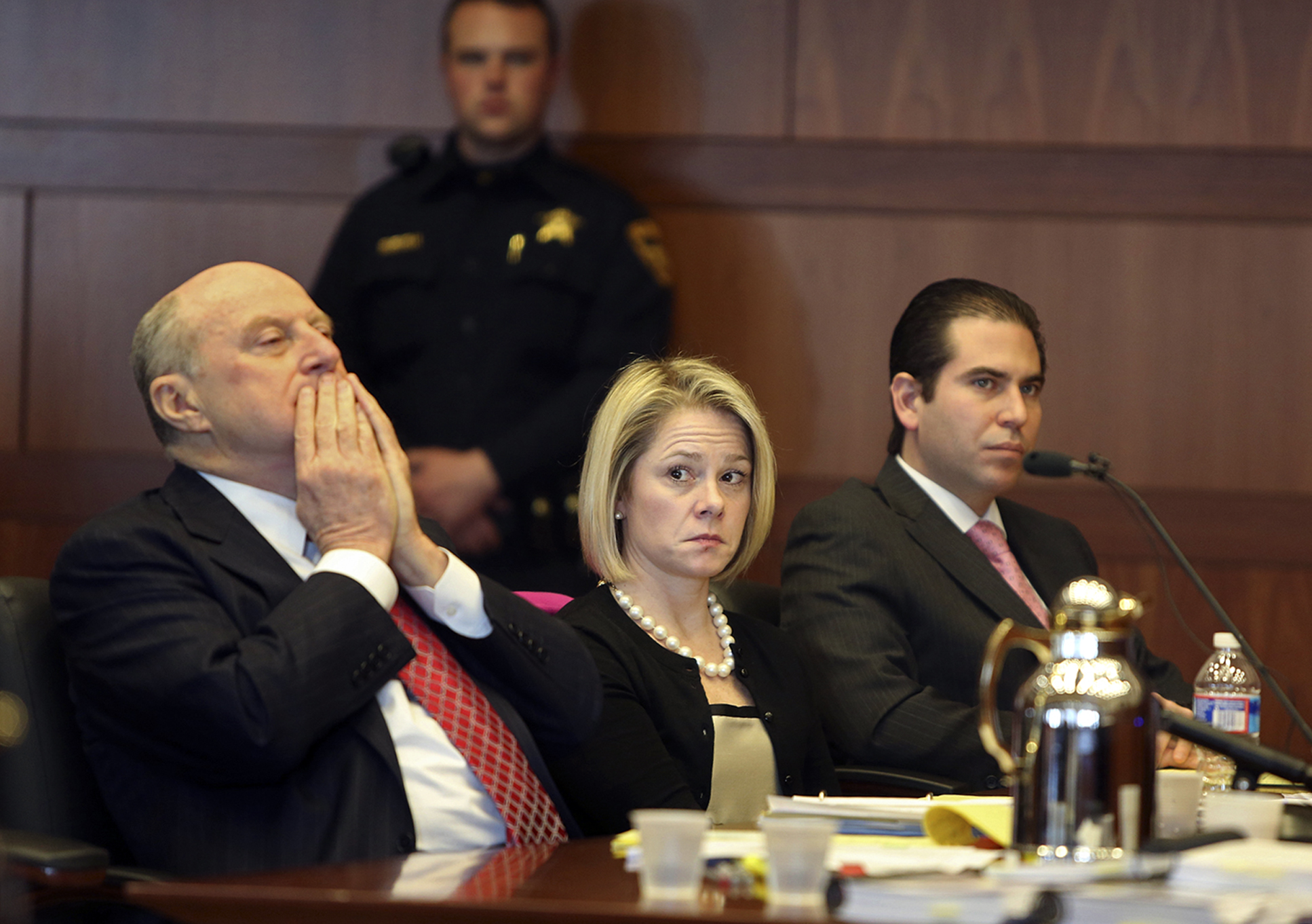 New Jersey Gov. Chris Christie's former Deputy Chief of Staff Bridget Anne Kelly, center, sits with her attorney Michael Critchley, left, and defense team member attorney Edmund DeNoia, right,  during a hearing Tuesday, March 11, 2014, in Trenton, N.J. Attorneys for Kelly and former Christie campaign manager Bill Stepien were in court to try to persuade a judge not to force them to turn over text messages and other private communications to New Jersey legislators investigating the political payback scandal ensnaring Christie's administration. (AP Photo/The Record of Bergen County, Chris Pedota, Pool) (AP)