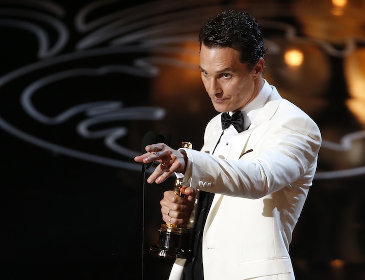 Matthew McConaughey accepts the Oscar for best actor for his role in "Dallas Buyers Club" at the 86th Academy Awards in Hollywood, California March 2, 2014. (REUTERS/Lucy Nicholson)