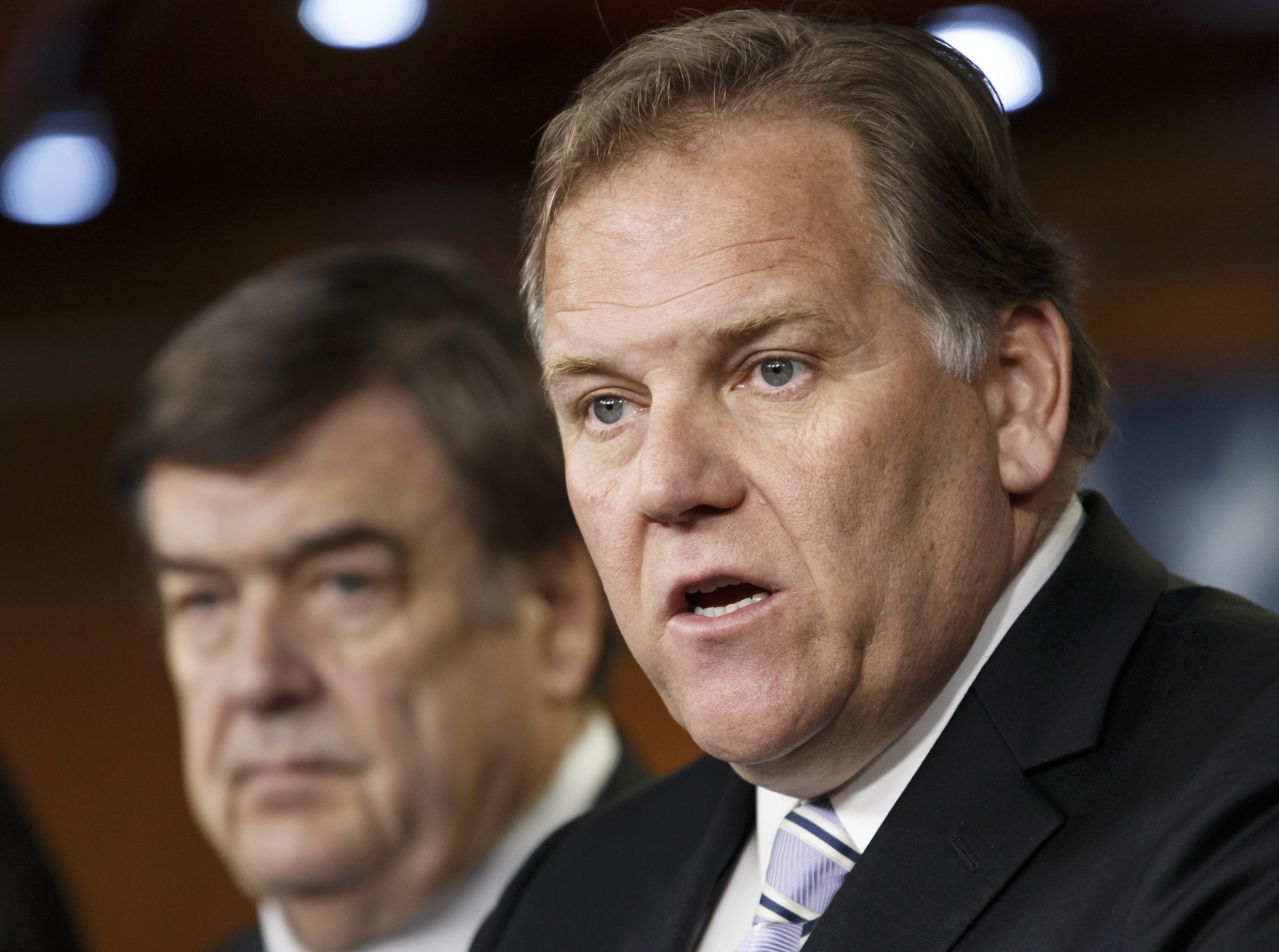House Intelligence Committee Chairman Rep. Mike Rogers, R-Mich., right, accompanied by the committee's ranking member Rep. C.A. Dutch Ruppersberger, D-Md. (AP)