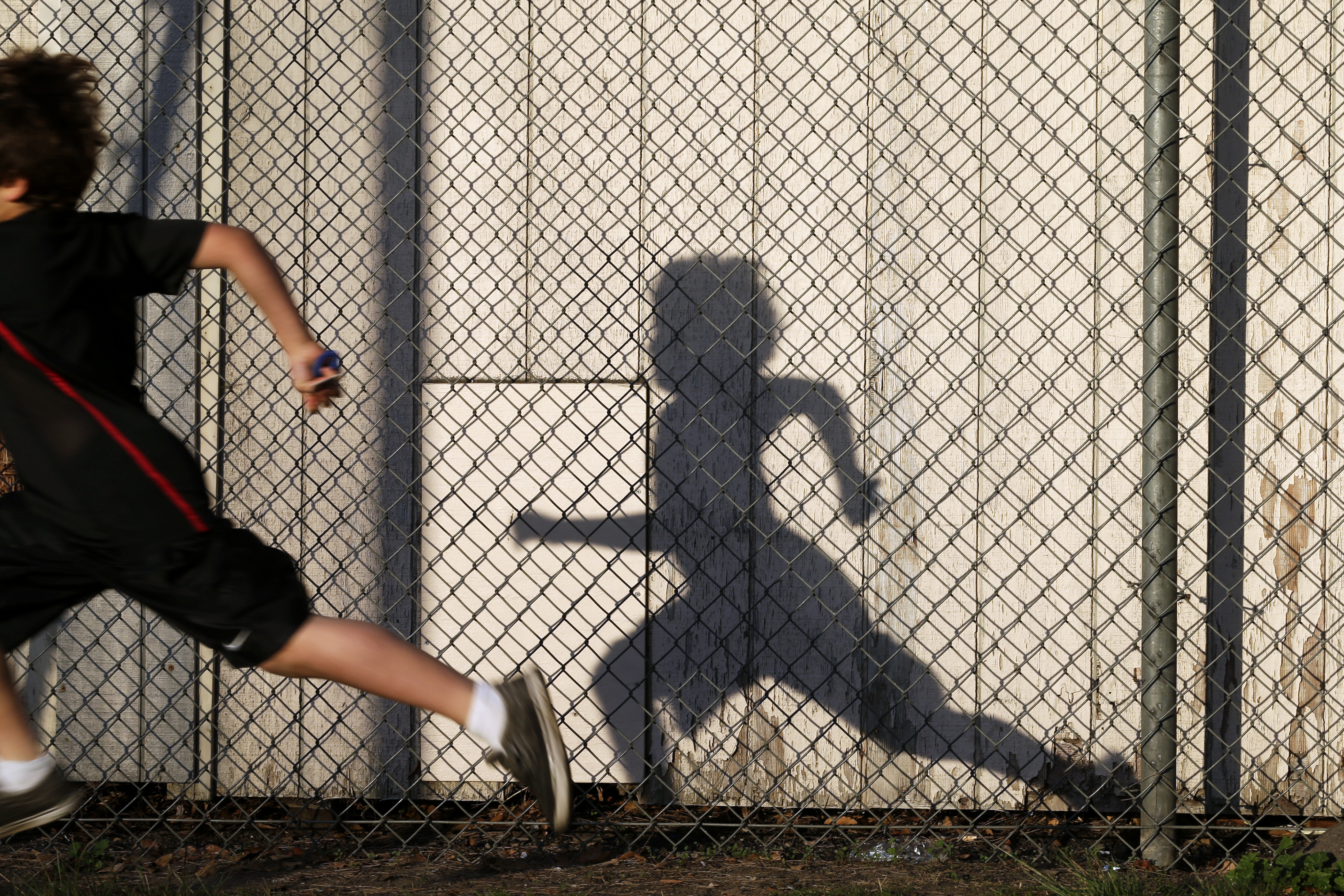 In this March 14, 2014 picture, students take part in an early morning running program at an elementary school in Chula Vista, Calif. Amid alarming national statistics showing an epidemic in childhood obesity, hundreds of thousands of students across the country are being weighed and measured. The Chula Vista Elementary School District is being touted as a model for its methods that have resulted in motivating the community to take action. (AP/Gregory Bull)