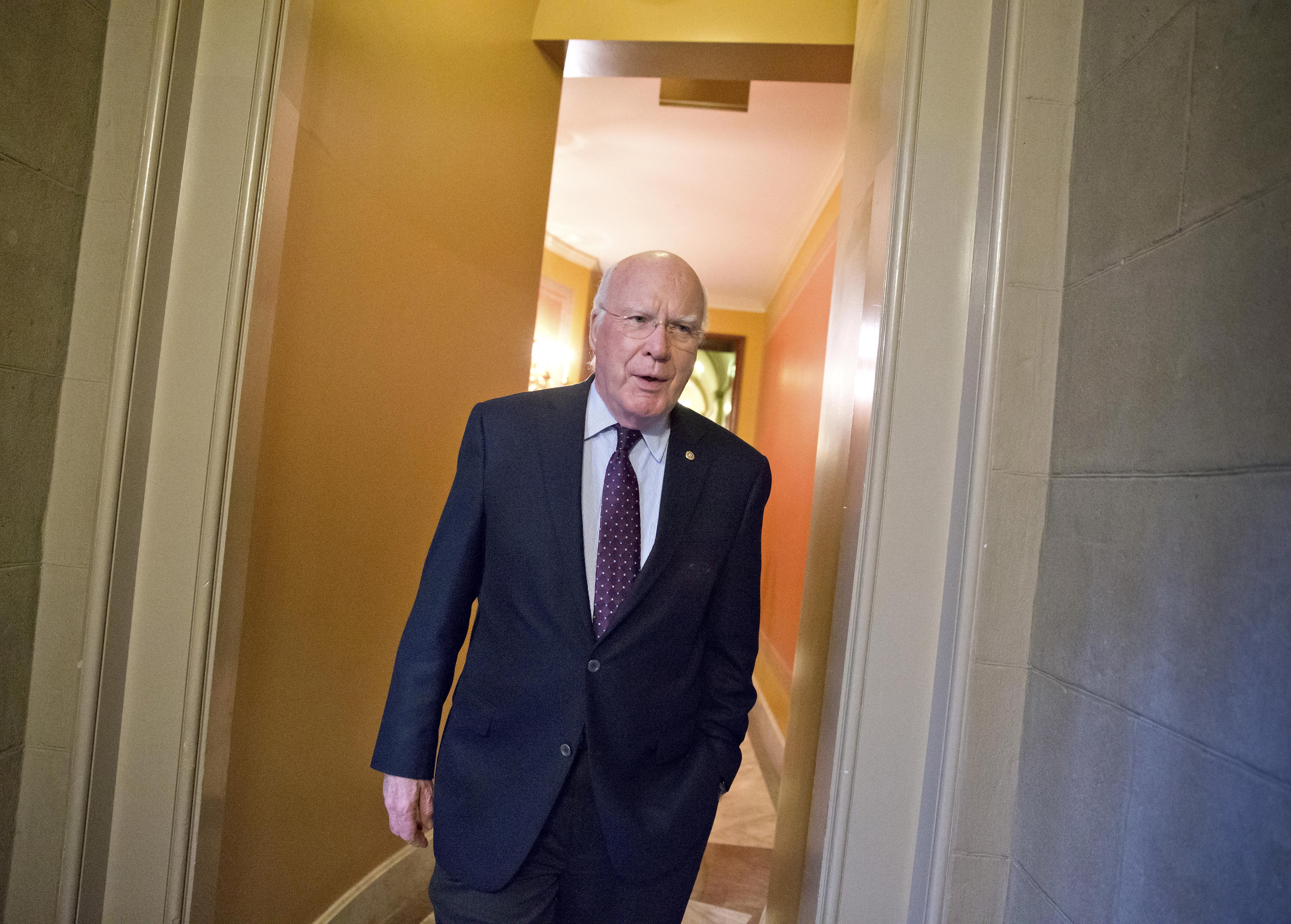 This Oct. 14, 2013 file photo shows Senate Judiciary Committee Chairman Patrick Leahy, D-Vt., walking through a corridor at the Capitol in Washington. ((AP Photo/J. Scott Applewhite))