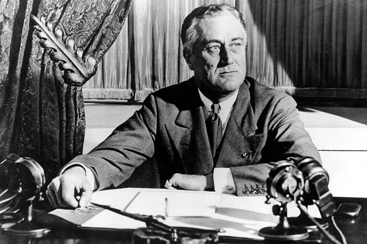 Franklin D. Roosevelt delivers his first radio "Fireside Chat" in Washington in March 1933. (AP)