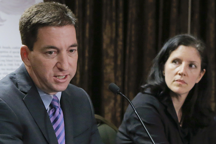 Glenn Greenwald, Laura Poitras (Reuters/Eduardo Munoz)