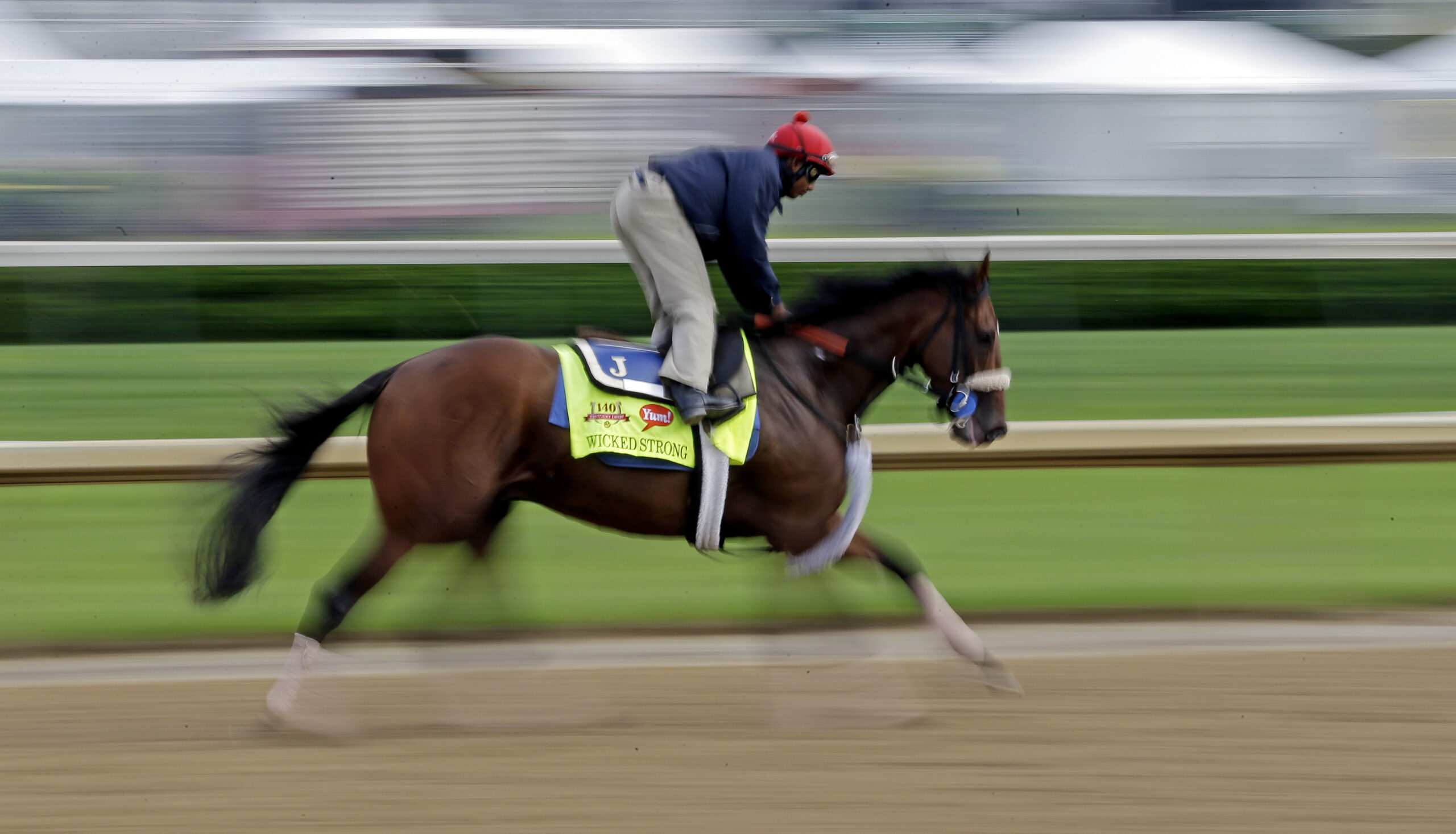 Kentucky Derby hopeful Wicked Strong gets a morning workout at Churchill Downs. (AP/Morry Gash)