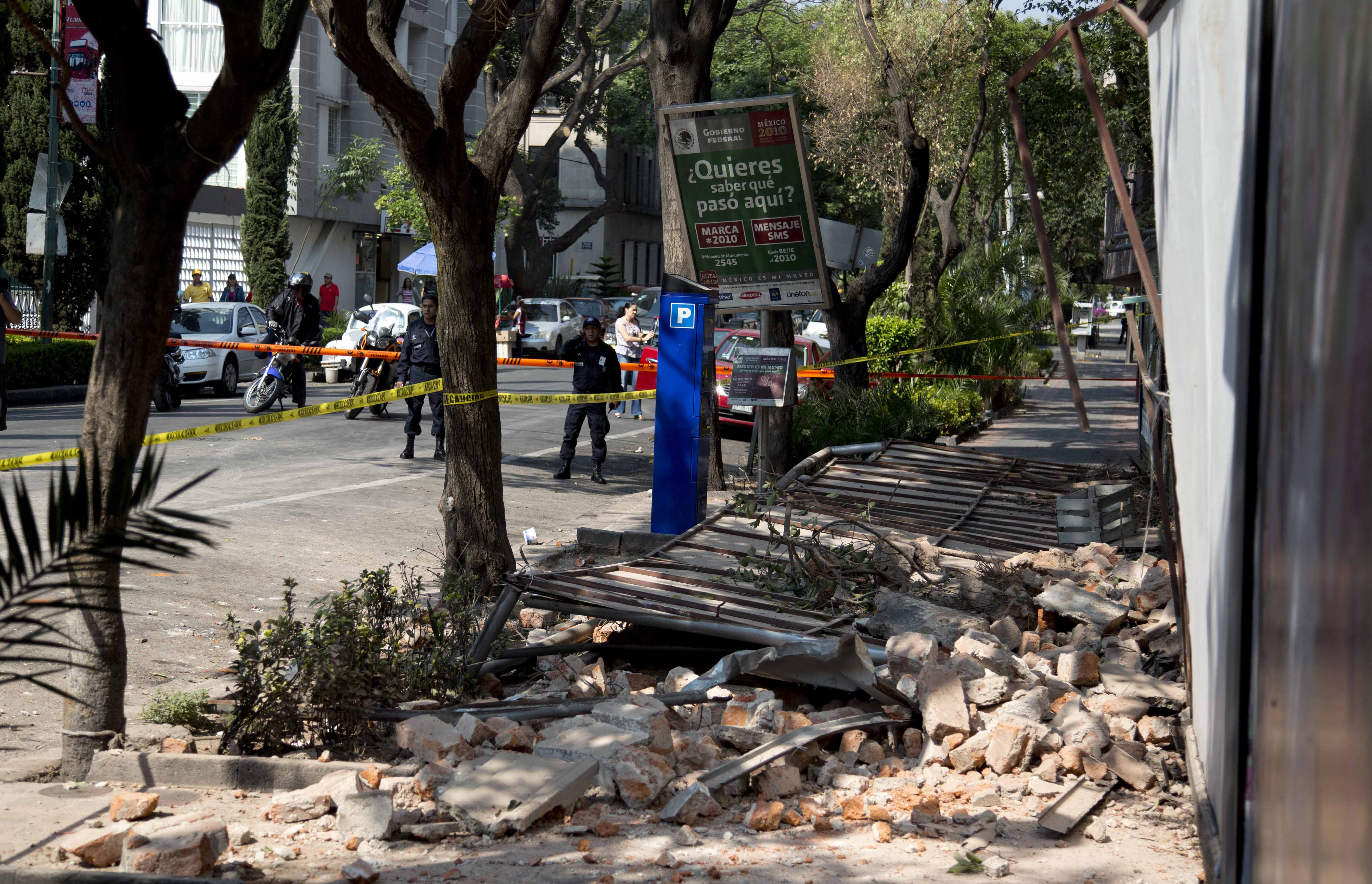 A damaged abandoned home is seen at the Juarez neighborhood after a strong earthquake jolted Mexico City, Friday, April 18, 2014. A powerful magnitude-7.2 earthquake shook central and southern Mexico but there were no early reports of major damage or casualties. (AP Photo/Eduardo Verdugo) (AP)