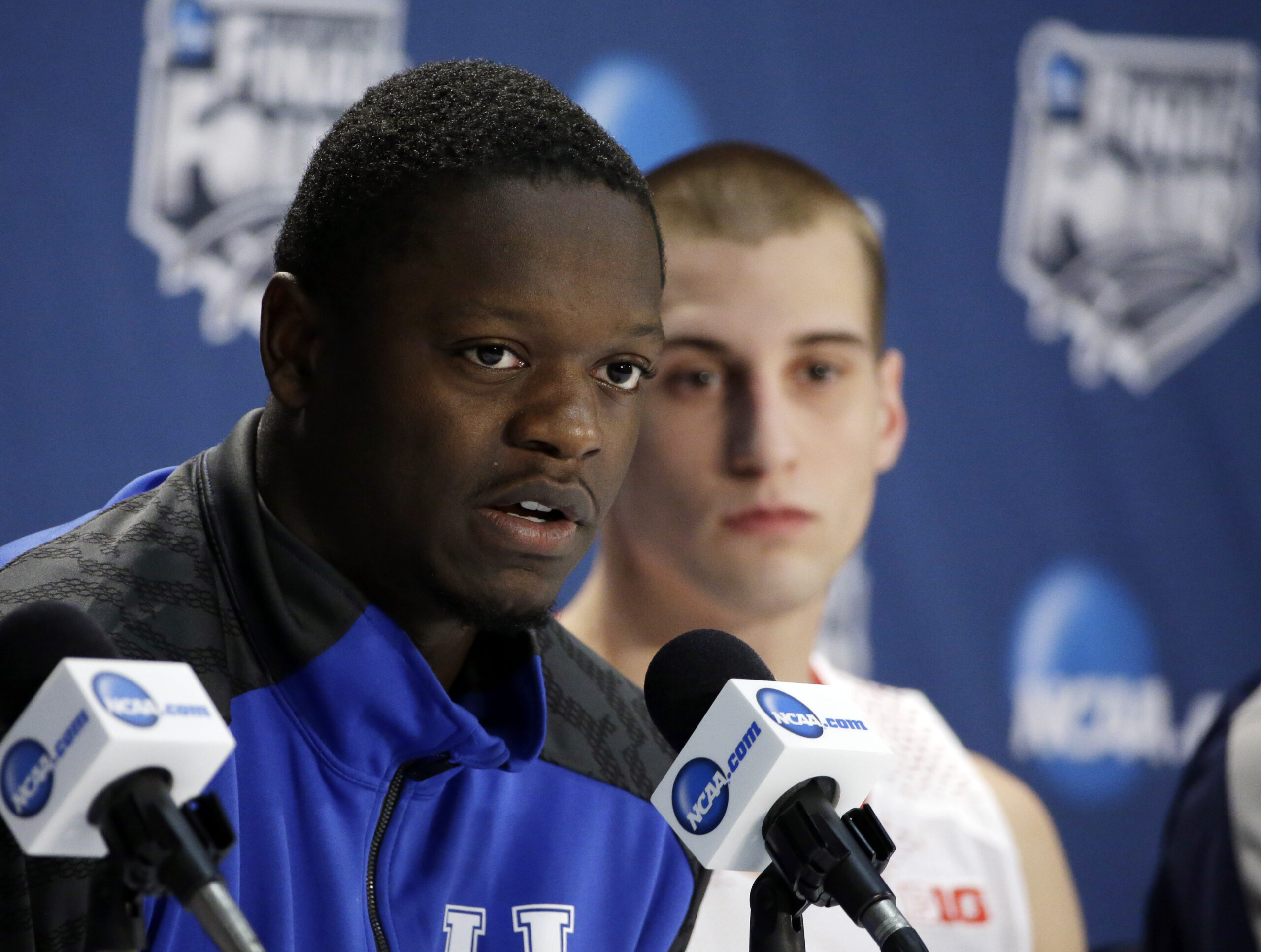 Kentucky's Julius Randle, left, and Wisconsin's Ben Brust participate in a news conference for their NCAA Final Four tournament college basketball semifinal game Thursday, April 3, 2014, in Dallas. (AP/David J. Phillip)