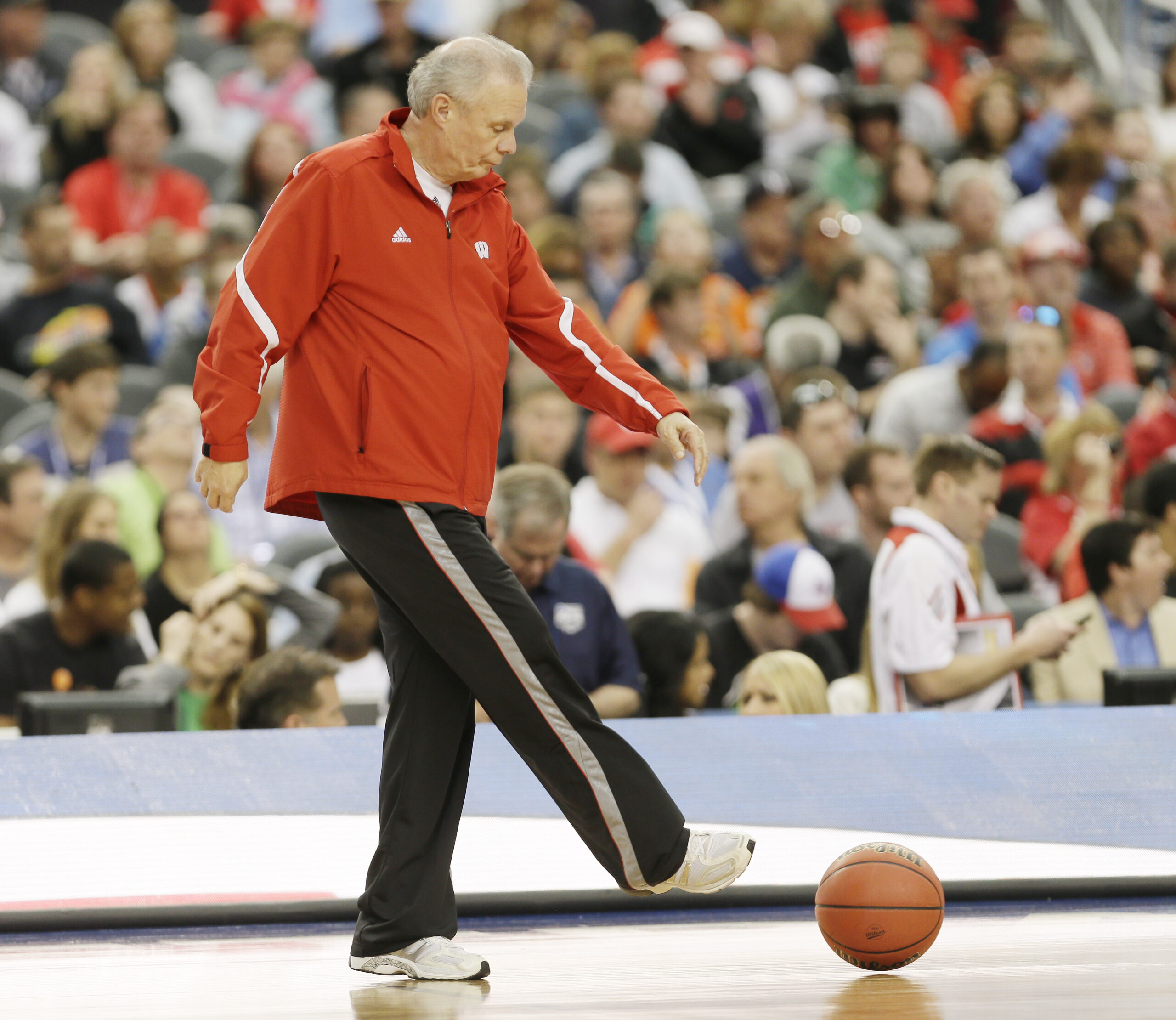 Wisconsin head coach Bo Ryan clears a ball from the floor during practice for an NCAA Final Four tournament college basketball semifinal game Friday, April 4, 2014, in Dallas. Wisconsin plays Kentucky on Saturday, April 5, 2014. (AP Photo/Charlie Neibergall) (Charlie Neibergall)