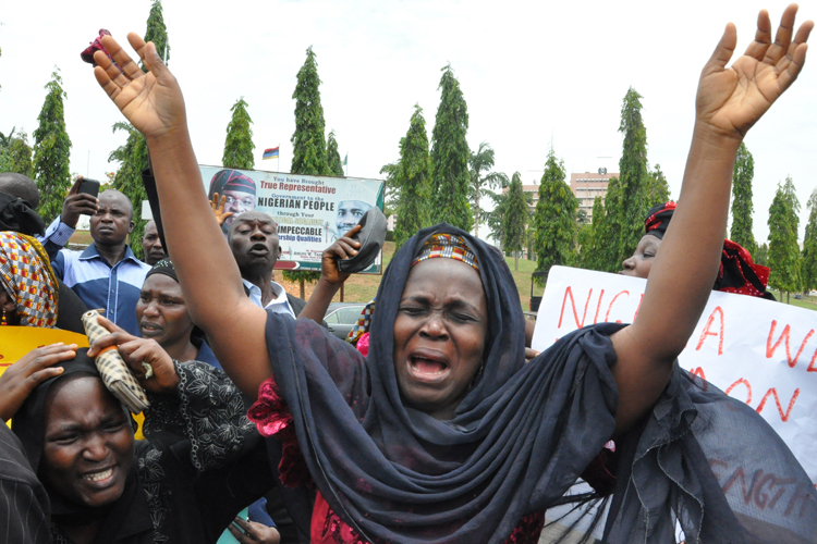 An unidentified mother at a demonstration with others who have daughters among the kidnapped school girls of government secondary school Chibok, Tuesday April 29, 2014, in Abuja, Nigeria. (AP/Gbemiga Olamikan)