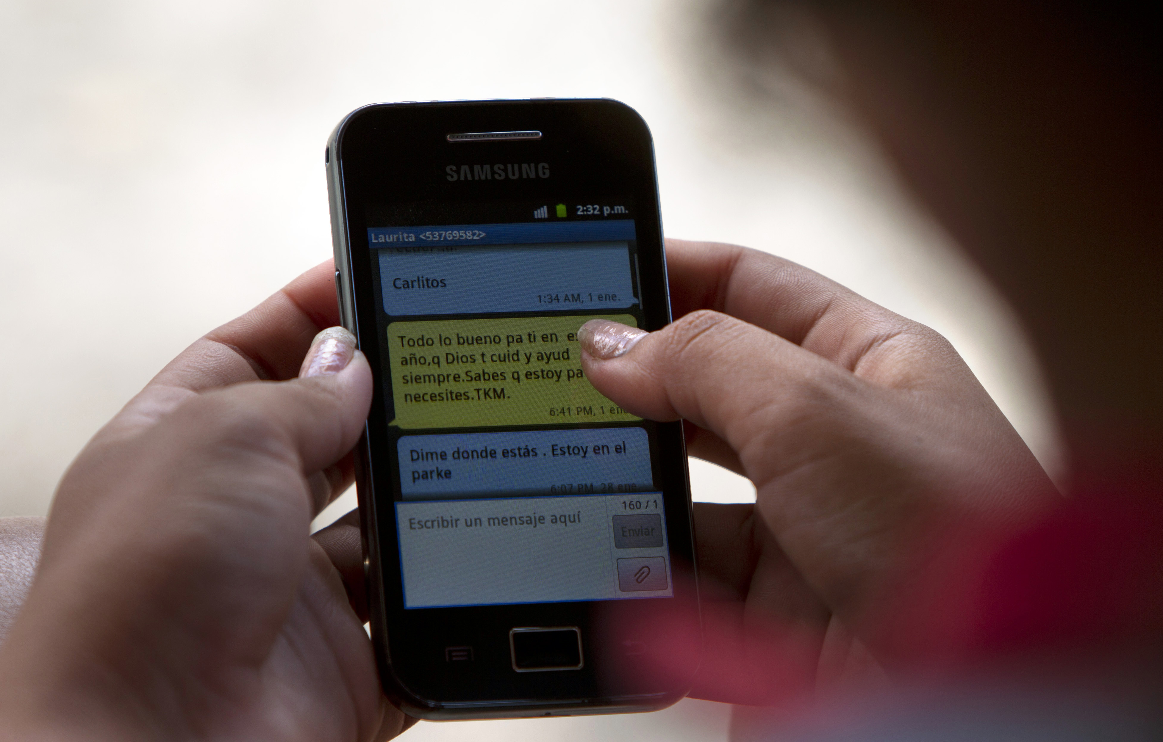 In this March 3, 2014, photo, a woman uses her cellphone in Camajuani, Cuba. The U.S. Agency for International Development masterminded the creation of a "Cuban Twitter," a communications network designed to undermine the communist government in Cuba, built with secret shell companies and financed through foreign banks, The Associated Press has learned. The project, which lasted more than two years and drew tens of thousands of subscribers, sought to evade Cubas stranglehold on the Internet with a primitive social media platform. Its users were neither aware it was created by a U.S. agency with ties to the State Department, nor that American contractors were gathering personal data about them. (AP Photo/Franklin Reyes) (AP)