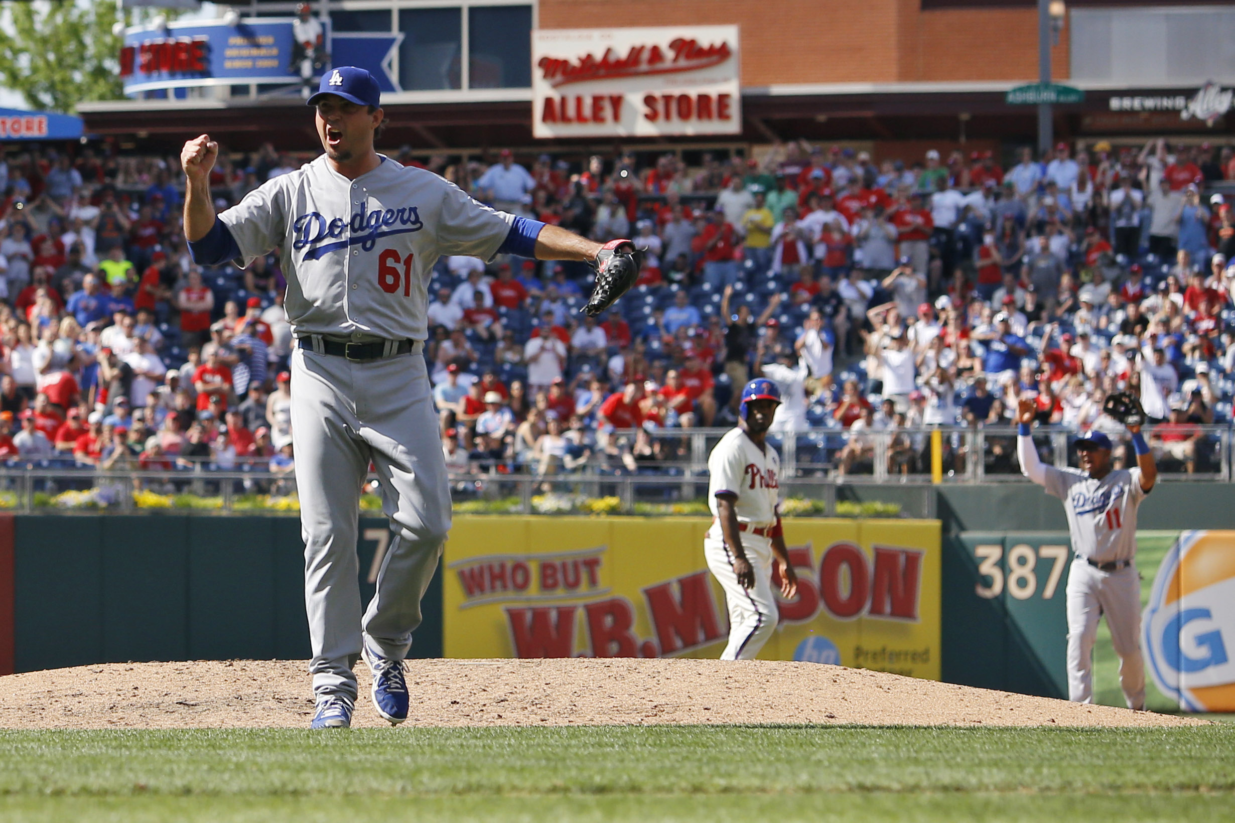 Los Angeles Dodgers starting pitcher Josh Beckett reacts after striking out Philadelphia Phillies' Chase Utley looking for a no-hitter baseball game, Sunday, May 25, 2014, in Philadelphia. Los Angeles won 6-0. (AP Photo/Matt Slocum) (AP)