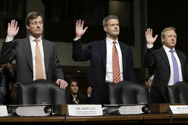Credit Suisse officials CEO Brady Dougan, Robert Shafir and Hans Urlich-Mesiter are sworn in before the Senate Homeland and Governmental Affairs Investigations Subcommittee, February 26, 2014. (Reuters/Gary Cameron)